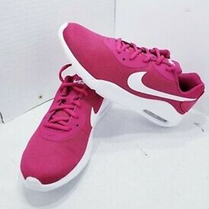 Ladies wild cherry fuscia Nike shoes.